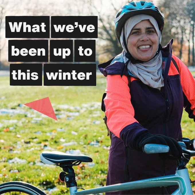 Person next to bike smiling to camera with text overlaid that reads: 'What we've been up to this winter'