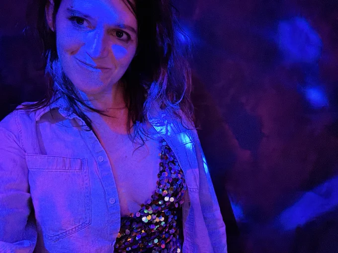 Me in sequins and denim shirt with disco lights