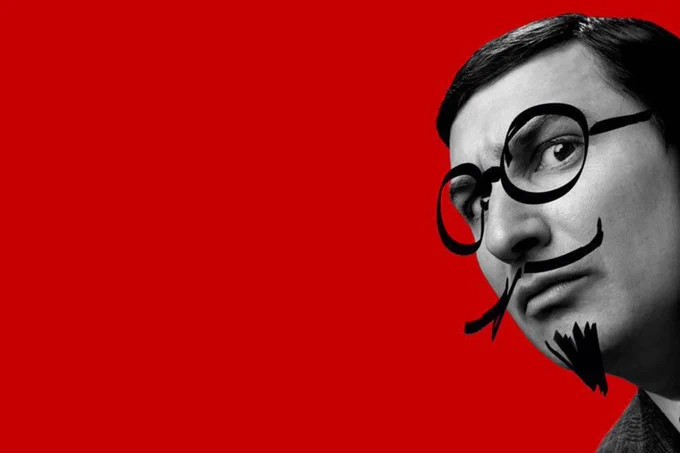 Tom Rosenthal pulls a concerned face, glasses and facial hair have been drawn on