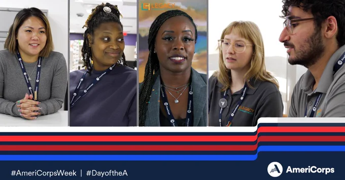 Group of AmeriCorps volunteers smiling, wearing lanyards with blue uniforms. Hashtags #AmeriCorpsWeek and #DayoftheA are displayed alongside the AmeriCorps logo.