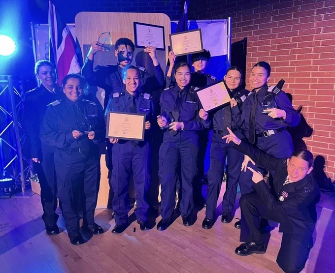 Barnet Volunteer Police Cadets unit & staff who won four major awards at the Met's Annual VPC Awards. Photo shows Cadets in uniform on stage with their Awards. 