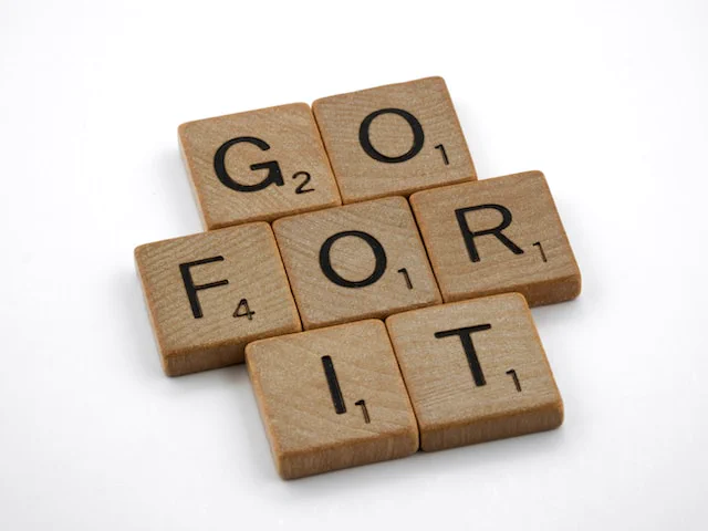 "Go for it" written in scrabble tiles