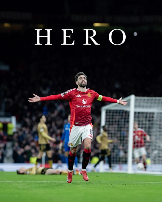 Bruno Fernandes celebrates his third goal of the night. Text above him reads 'HERO'.