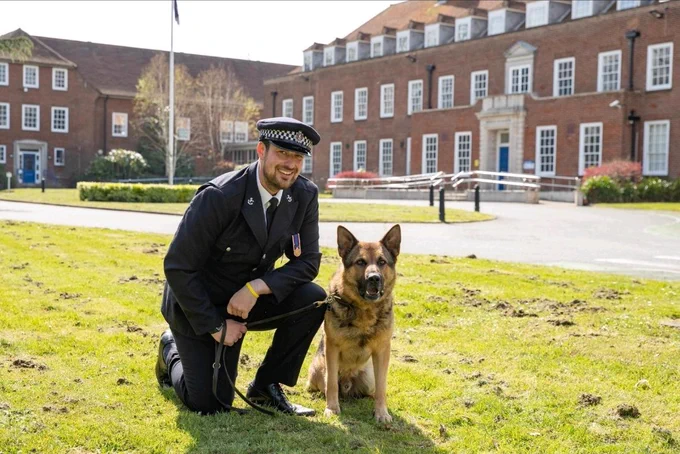 Police Constable Southern with German Shepherd, PD Boris, pictured outside Kent Police HQ in Maidstone. 