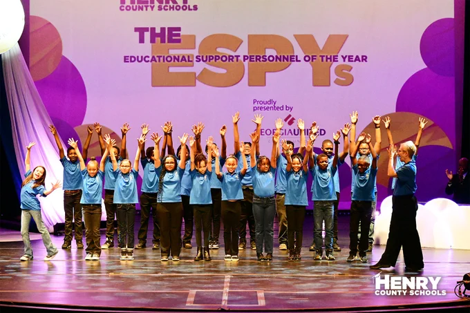 Impact Academy Elementary Choir opens the show