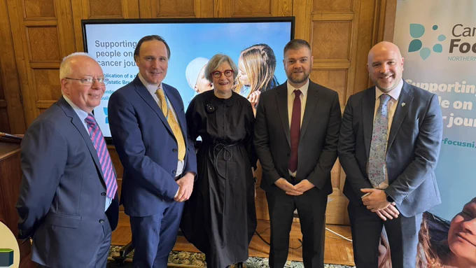 Colin is pictured with Richard Spratt of Cancer Focus, Ann McBrien who lives with metastatic breast cancer, Dr Damien Bennett and Dr Kyle Crawford