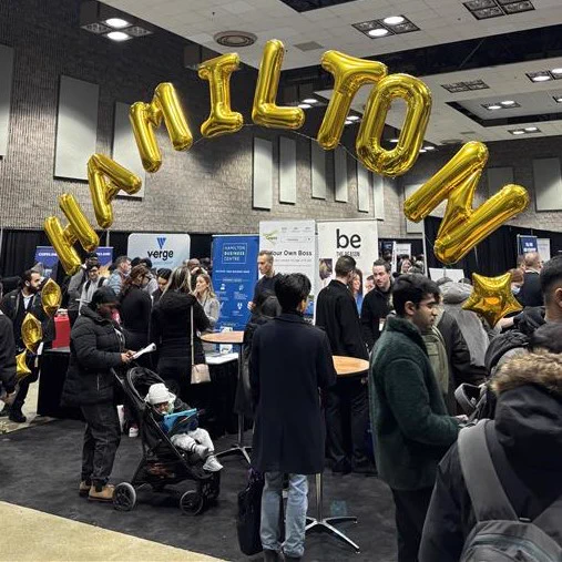 Crowd at Connect to Careers Job Fair. Balloon display with letters spelling out "Hamilton."