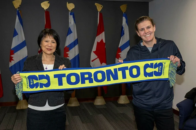 Mayor Chow & Canadian here Christine St. Clair with FIFA Toronto scarf.