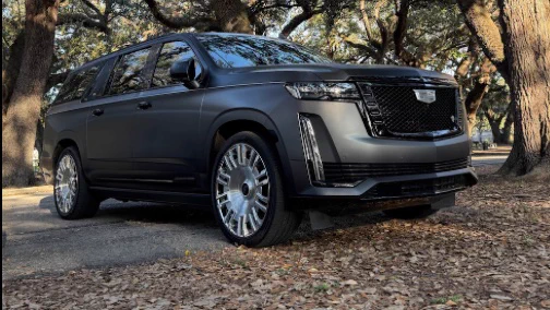 This is not just another Escalade; it is a bold transformation.

MetroWrapz, known for its industry-leading wraps and finishes, has elevated this Cadillac to the next level with a sleek satin finish that exudes sophistication. Paired with STRUT’s signature grille and accents, this build perfectly blends aggressive styling with refined elegance.

**Key Features of This Build:**

- MetroWrapz Custom Satin Finish
- STRUT Signature Grille & Badging
- Forgiato Wheels
- Blacked-Out Accents & Lighting Enhancements

**The Perfect Combination of Style & Performance**

With this build, STRUT and MetroWrapz demonstrate that the right combination of custom finishes, premium materials, and meticulous craftsmanship can transform any vehicle into a masterpiece.

**Get the Look**
 
Want to achieve this level of customization for your ride? Explore STRUT’s collection of luxury grilles, custom wheels, and high-performance automotive accessories.