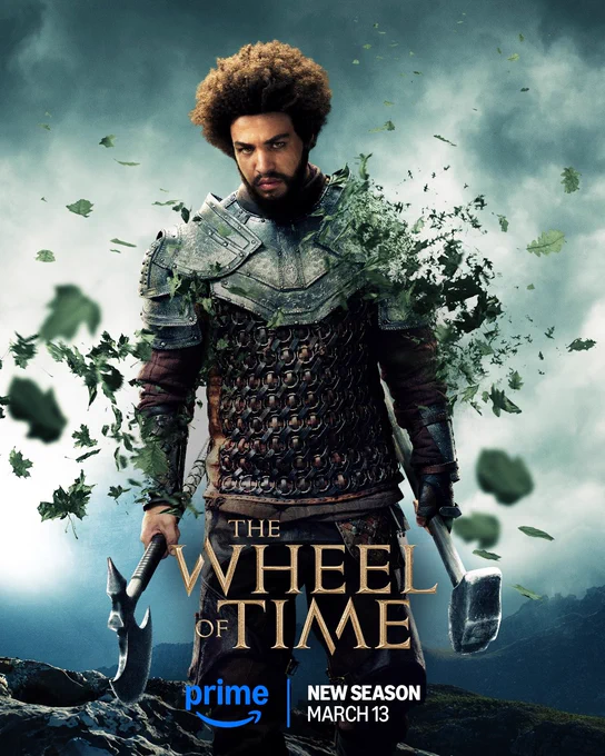 A poster of Perrin Aybara (Marcus Rutherford) in The Wheel of Time Season 3. Stood in a mountainous landscape, his body and armour are beginning to dissolve into swirling leaves. The Wheel of Time logo is center at the bottom of the image, with the Prime Video logo beneath and text reading: “New Season March 13”.