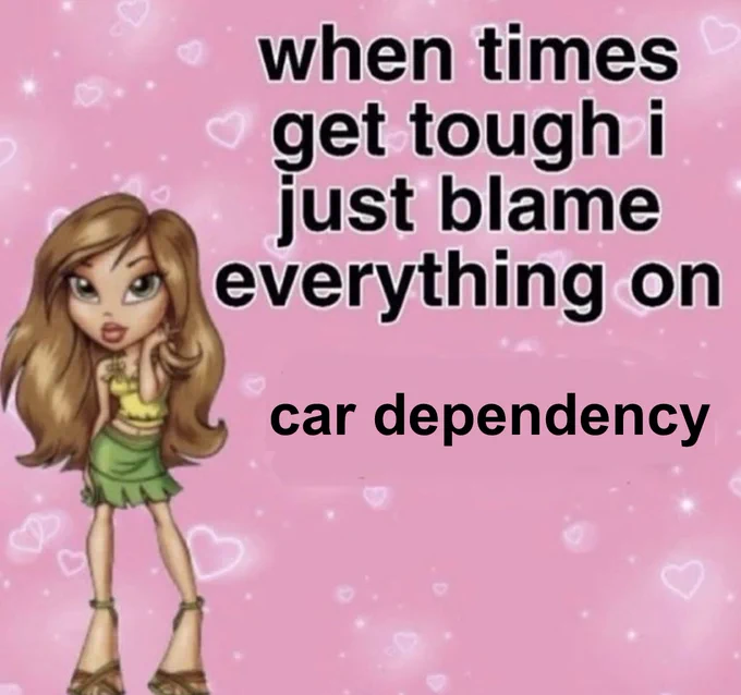 Meme of cartoon girl on pink hearts background with text: "when times get tough i just blame everything on car dependency"