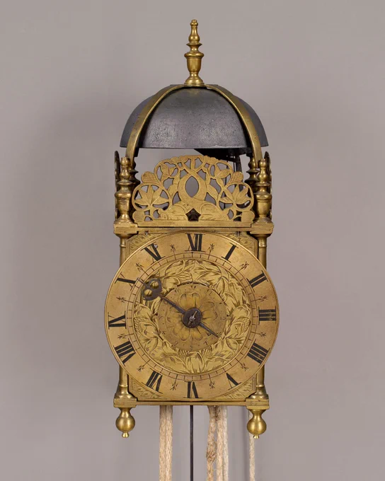 3rd Period Lantern Clock, London ~1685

A fine 3rd Period London Lantern Clock with hour strike and alarm. The dial has an elaborately engraved centre with tulips and foliage and a typically narrow chapter ring with Roman numerals.
https://walwynantiqueclocks.com/fine-antique-clocks/3rd-period-lantern-clock-detail
#lanternclocks #HorologicalHistory #FineTimepieces #BritishClocks #PeriodInteriors #AntiqueClocks #RareTimepieces