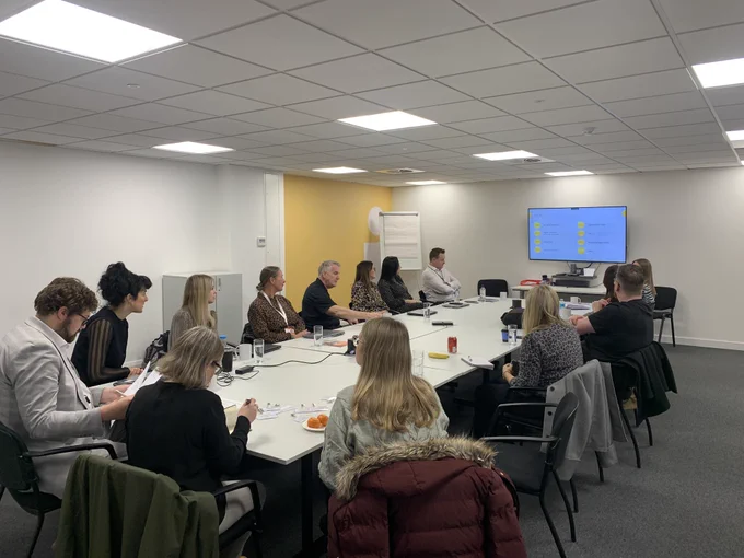 Explore Day at Ingeus. Charter Supporters and Members sat round a table learning from peers.