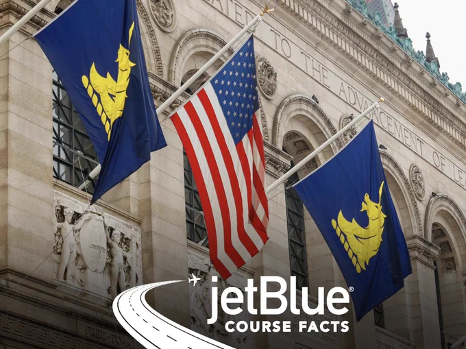 Image of an American flag and two B.A.A. flags on the side of the Boston Public Library with the white “jetBlue COURSE FACTS” overlay
