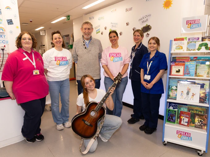 Evelina London staff members with Spread a Smile staff members and Michael Rosen