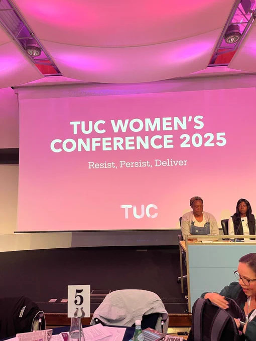 Photo of the sign of the TUC Women's Conference 2025 with the message 'Resist. Persist. Deliver'.