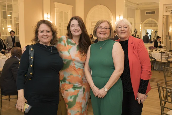 Emma, Melanie, Mary, and Helena standing for a photo