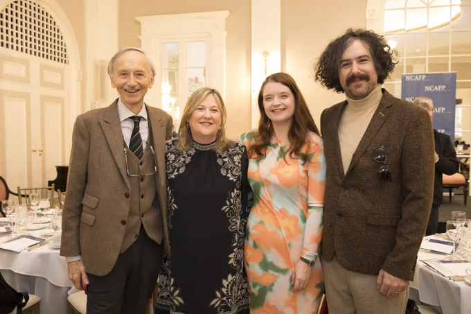 Ted, Roseann Kelly, Emma and Jake standing for a photo