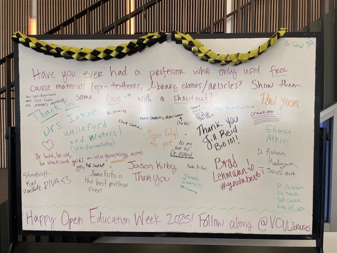 A whiteboard with the question, 'Have you ever had a professor who only used free course materials (open textbooks, library ebooks/articles)? Show them some love with a shoutout! The board is covered with various faculty names and shoutouts. 