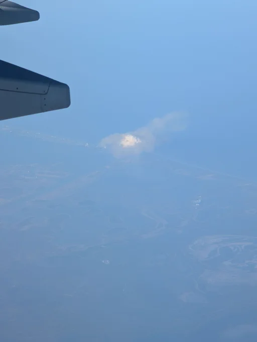 A view of the Boca Chica launch site, showing a huge cloud of smoke on the ground 