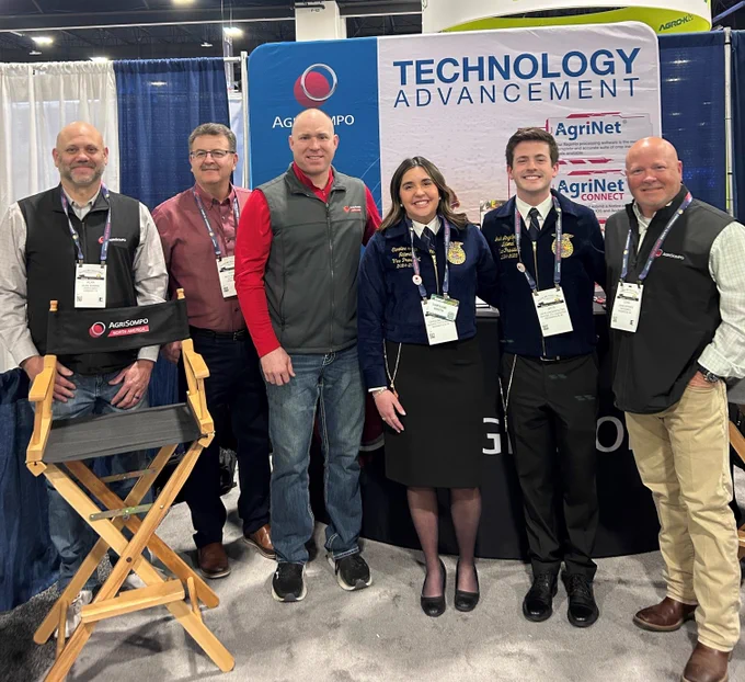 Alan Norris, Nick Raffaeli, Tyler Aring, and John Spence of AgriSompo with state FFA officers