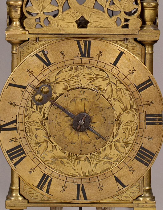 3rd Period Lantern Clock, London ~1685

A fine 3rd Period London Lantern Clock with hour strike and alarm. The dial has an elaborately engraved centre with tulips and foliage and a typically narrow chapter ring with Roman numerals.
https://walwynantiqueclocks.com/fine-antique-clocks/3rd-period-lantern-clock-detail
#lanternclocks #HorologicalHistory #FineTimepieces #BritishClocks #PeriodInteriors #AntiqueClocks #RareTimepieces
