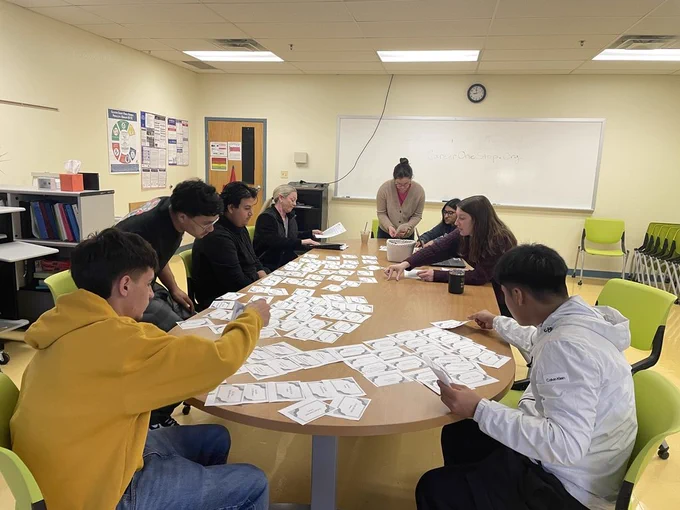 Student working around a table