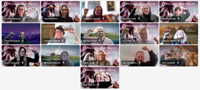 screenshot of people on a teams call holding up their arm in solidarity with women