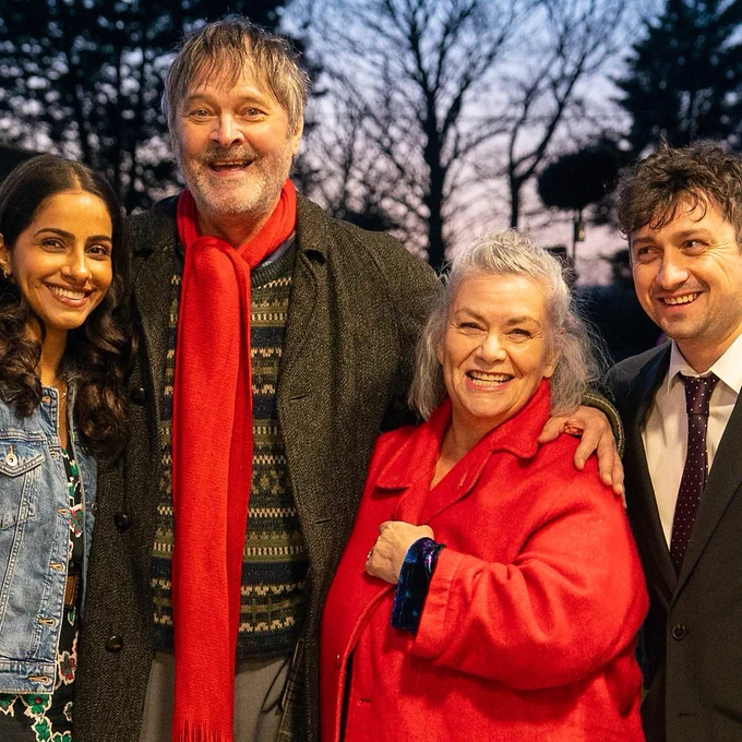 Photo of the stars of the upcoming BBC sitcom Can You Keep a Secret? Mandip Gill, Mark Heap, Dawn French and Craig Roberts stand in a line and smile to the camera.