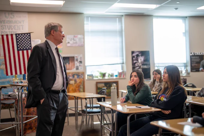 Colorado Supreme Court Justice Richard Gabriel speaks to Mead High government students