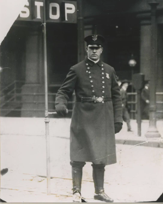 A photo of Officer Patrick "Pa" Conway, grandfather to Great Lakes co-owners Pat and Dan Conway, directing traffic in Cleveland Ohio.
