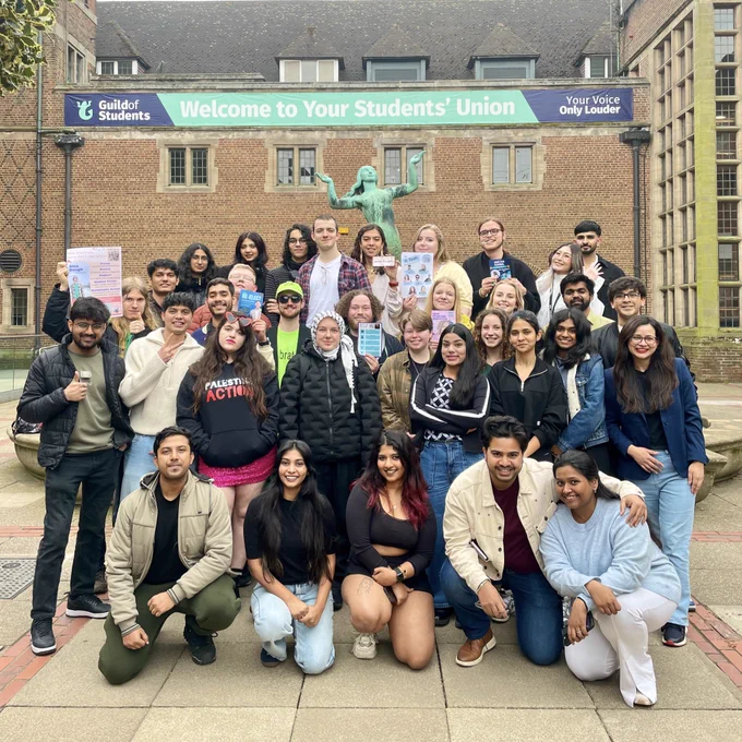 Image of multiple students smiling at the camera as the candidates for the Officer Elections 2025.