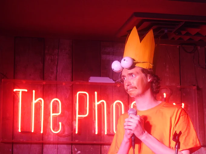 Bart Simpson staring sadly onstage