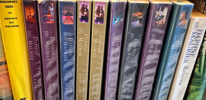 A shelf of books by Daphne Du Maurier