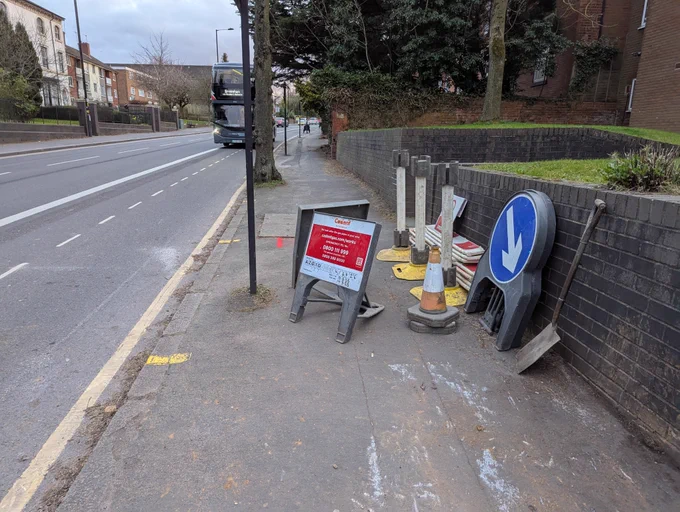 A Cadent Gas pedestrian diversion sign inconsiderately placed by contractors.