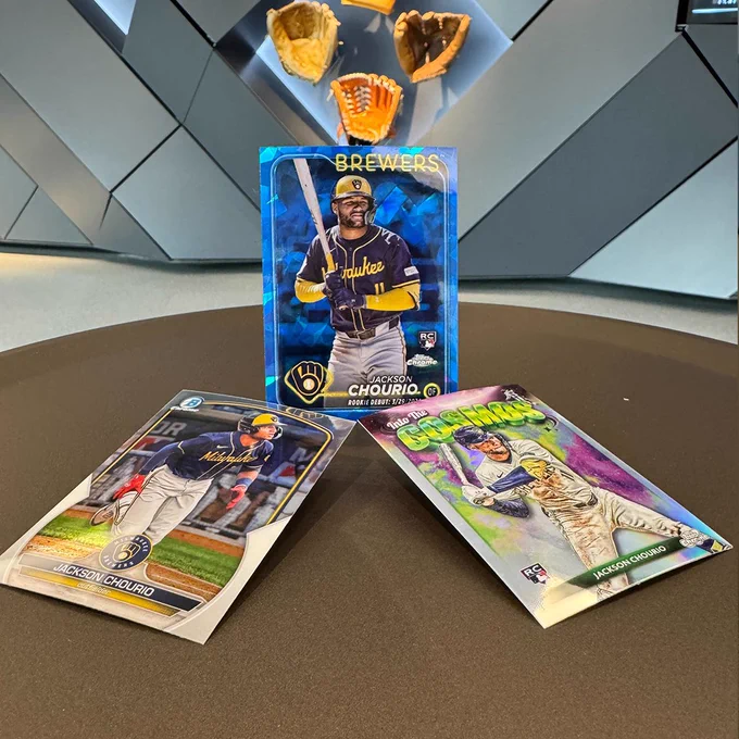 Three Jackson Chourio baseball cards:
2024 Topps Update Chrome Sapphire, Rookie Debut: 3/29/2024 RC, Jackson Chourio, Milwaukee Brewers
2024 Topps Chrome Into The Cosmos, Jackson Chourio RC, Milwaukee Brewers
2023 Bowman Chrome, Jackson Chourio, Milwaukee Brewers
