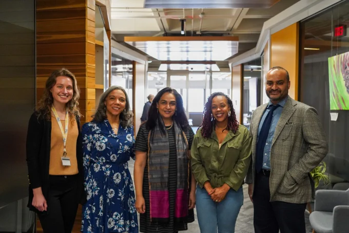 Dr. Supriya Baily, third from left, poses for a photo with CUE and IISE members.