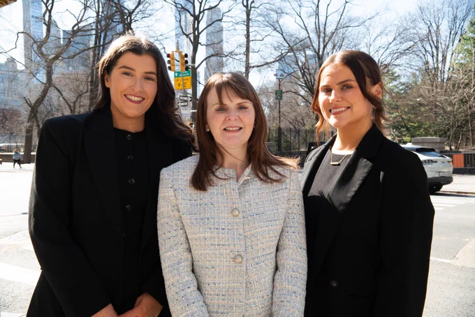 Economy Minister Dr Caoimhe Archibald is pictured with Study USA students Eve McDonnell and Emma Sheerin