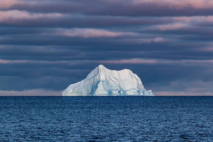 Cover photograph shows iceberg “Fred” under a brilliant sky. Photo credit: Erick Bravo, IODP JRSO.