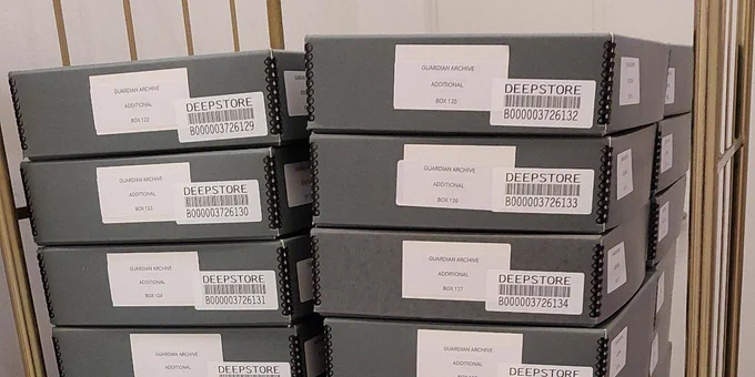 Archival boxes stacked up in loading bay