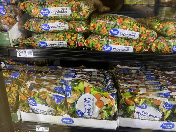 Freezer section showing $1 per pound vegetables