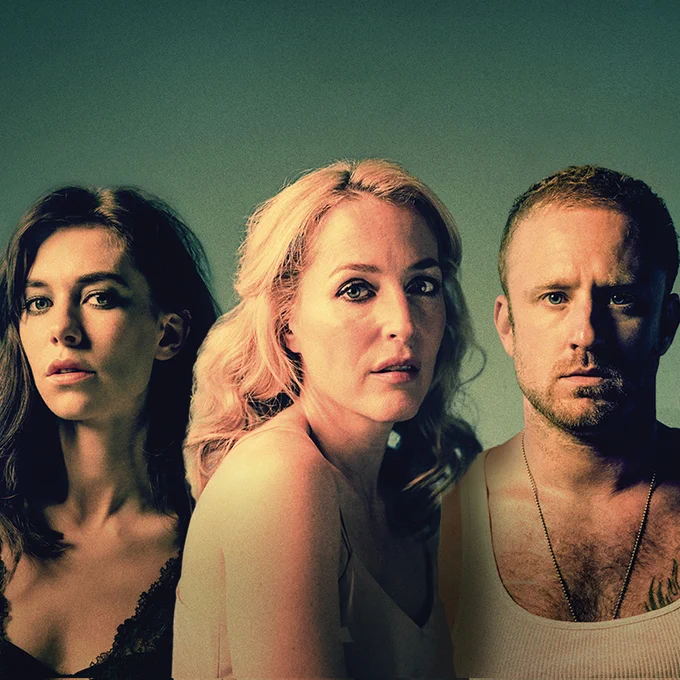 Promotional image featuring three actors with intense expressions, against a muted green background.