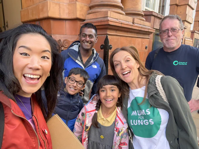 Asthma   Lung UK staff, Mums for lungs and Manchester Friends of the Earth standing outside Andy Burnham's office.