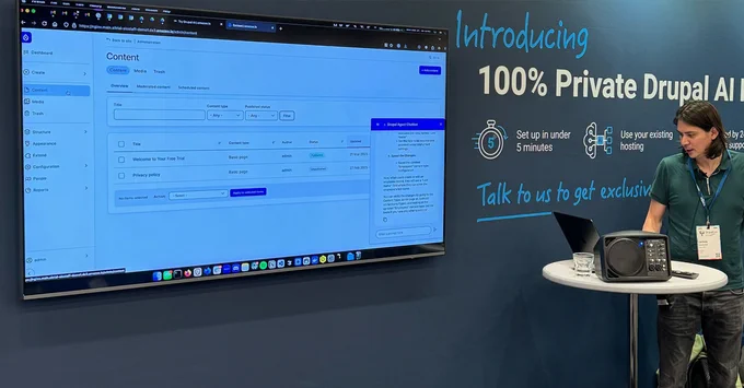 Jamie Abrahams presenting a demo at amazee.io's Booth - DrupalCon Atlanta 2025