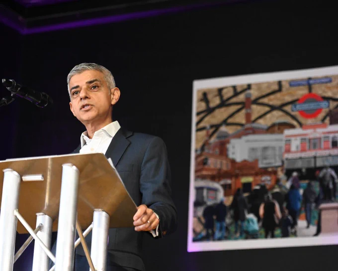 The Mayor of London stood at a lectern addressing the local community attending the opening.