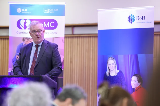 The Health Minister Mike Nesbitt speaking from a podium at the Regional Maternity and Neonatal Conference 