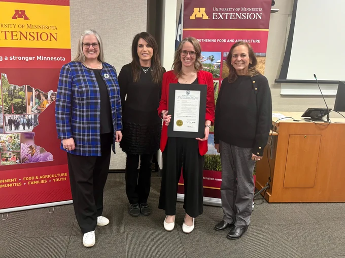 Carolyn Olson, Bobbie Harder, Andrea Vaubel and Bev Durgan pose with state proclamation recognizing March 24 as Women in Agriculture Day.