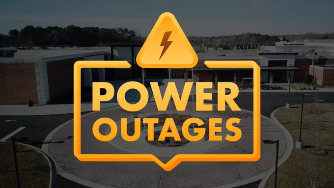 Image of exterior of building with text overlaid: "Power Outages".