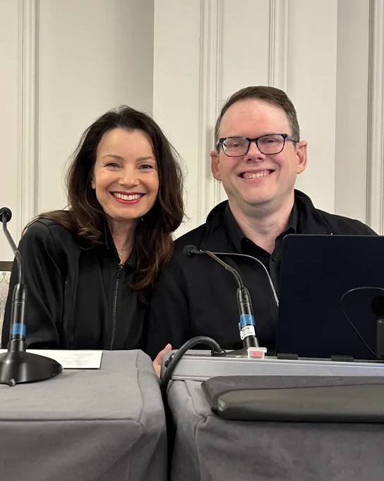 Fran Drescher and Duncan Crabtree-Ireland smiling.