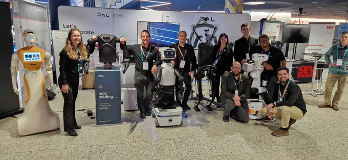 PAL Robotics' team at ERF 2025 with the entertainment and social robot ARI, the legged solution Kangaroo, the ultimate mobile manipulator TIAGo Pro and the reliable mobile manipulator TIAGo.